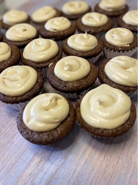 brownies topped with whipped caramel ganache