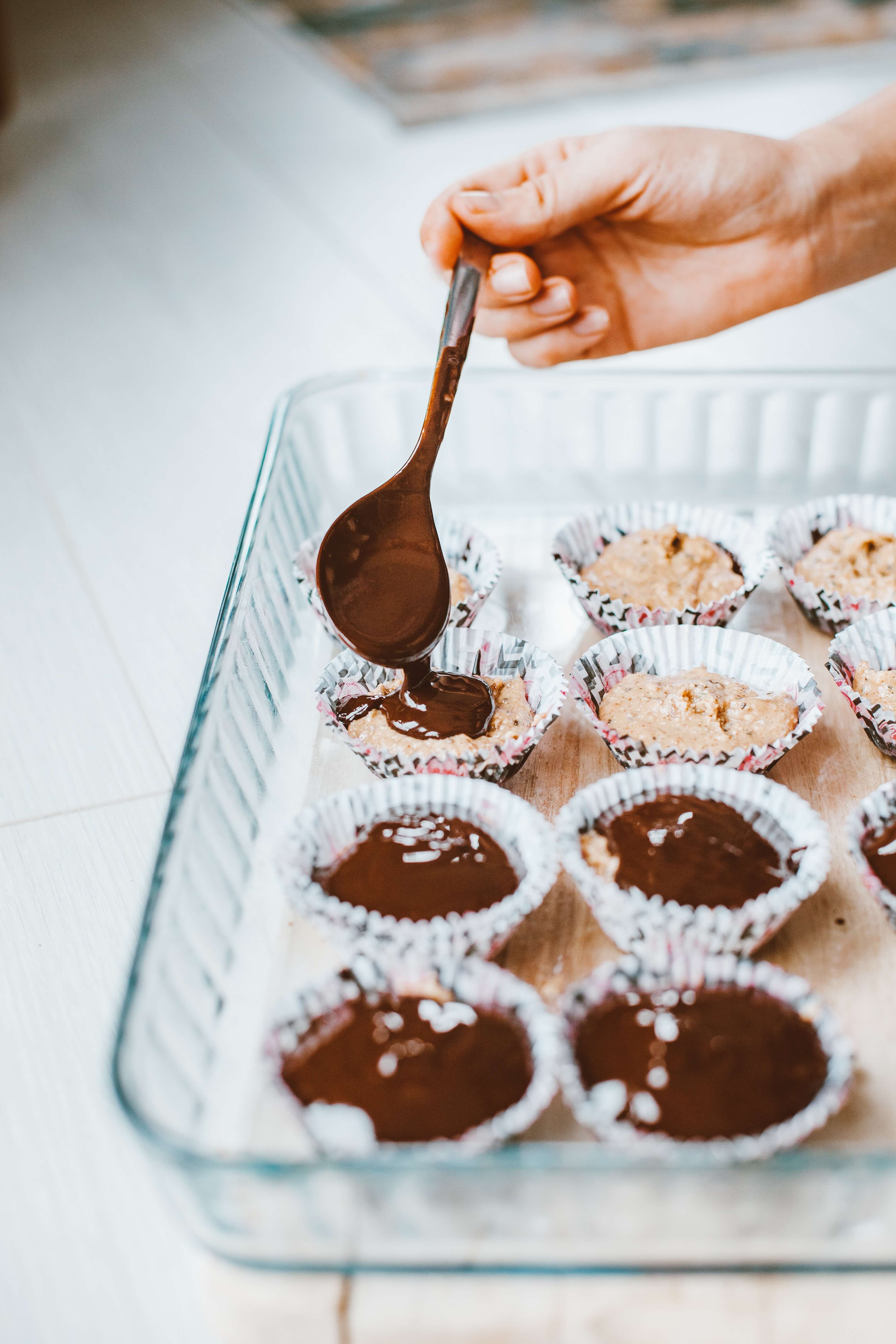 drizzle ganache on cupcakes to decorate