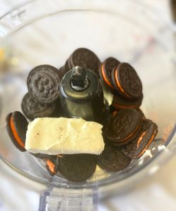 Place Oreos and cream cheese in food processor