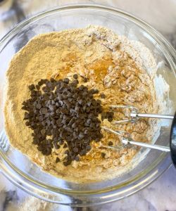 add chocolate chips to healthy pumpkin muffins