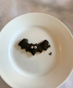 add eyes to bat cookie