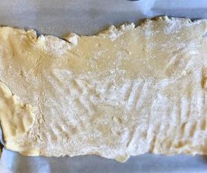 flatten dough on a cookie sheet lined with parchment paper and chill