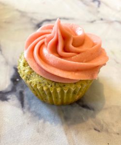 complete lemon poppy seed cupcake with fresh raspberry buttercream