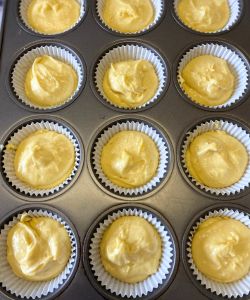 fill cupcake liners dairy-free mango cupcakes with mango frosting