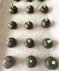 add stems to pumpkin shaped Oreo balls