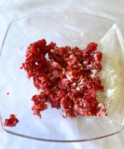 toss raspberries in flour