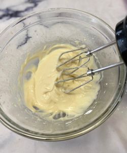 add milk and vanilla to cream cheese drizzle