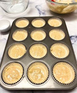 fill muffin tin banana muffins filled with strawberry jam