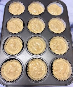 fill cupcake liners with homemade banana pudding cupcake batter