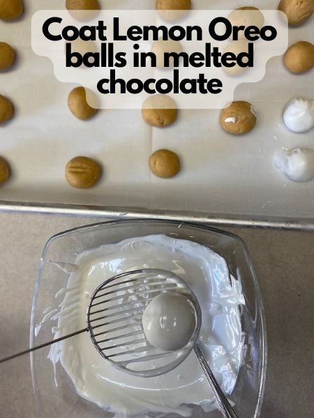 coat lemon Oreo balls in melted chocolate