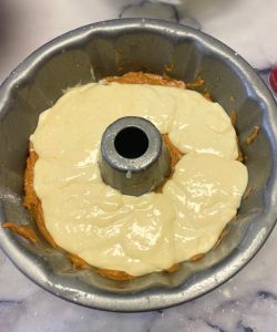 pour in cream cheese filling easy pumpkin spice cake