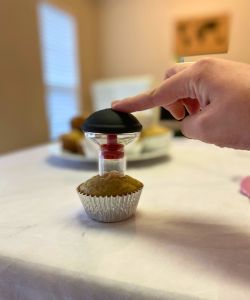 push down on cupcake coring tool