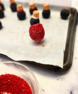 rest christmas ornament oreo balls upside down to dry