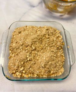 sprinkle butter mixture over poured pumpkin coffee cake batter