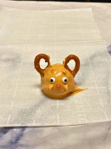 add eyes and nose reindeer shaped caramel Oreo balls