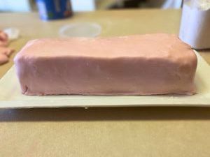 strawberry lemon rectangular layer cake covered in fondant