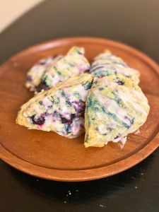 finished vegan blueberry scones with lemon glaze