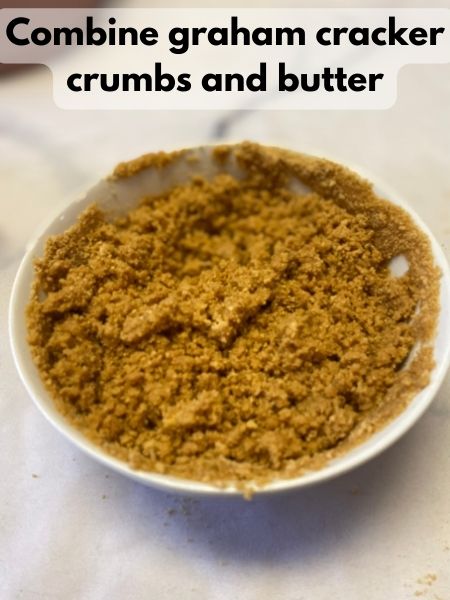 combine graham cracker crumbs and butter