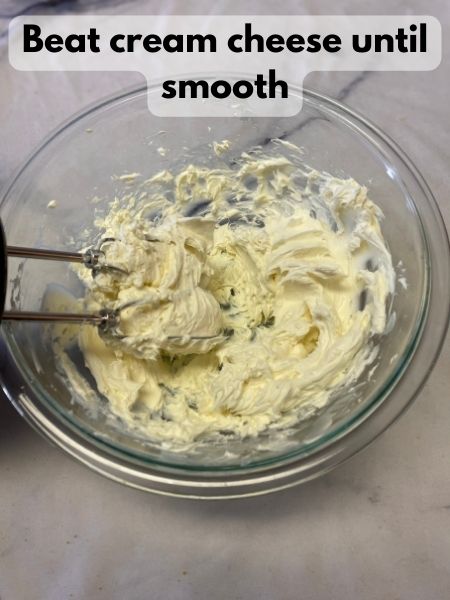 beat cream cheese until smooth