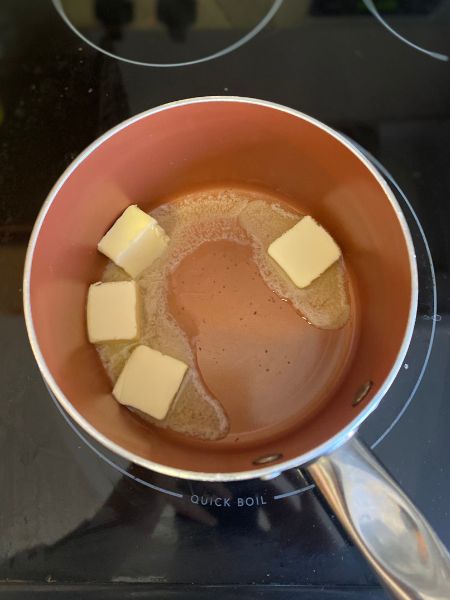 melting butter for browned butter maple frosting