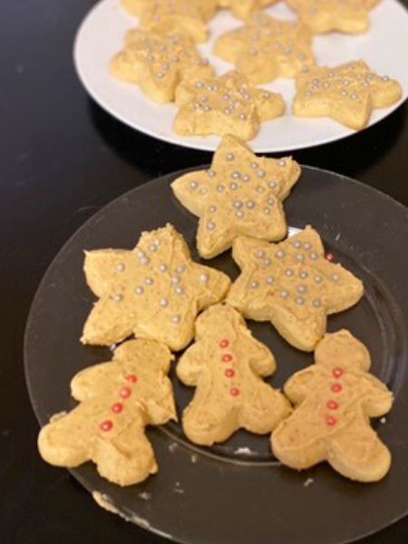 decorated soft fluffy sugar cutout cookies with browned butter maple frosting