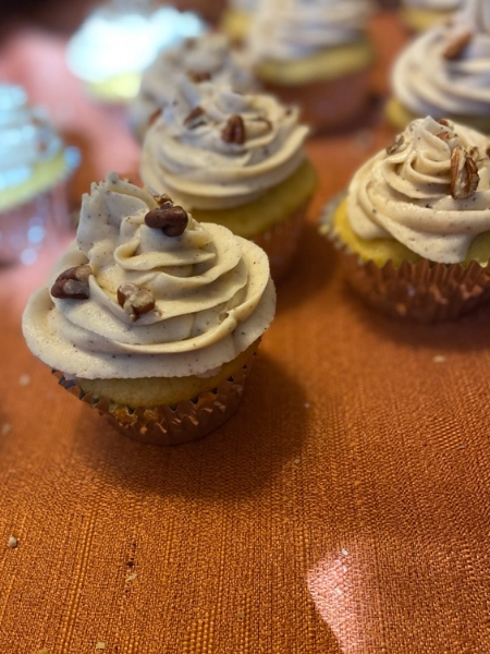 frost cupcakes, decorate with chopped pecans