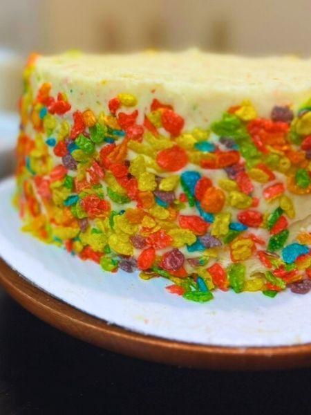 finished Fruity Pebbles layer cake from box mix