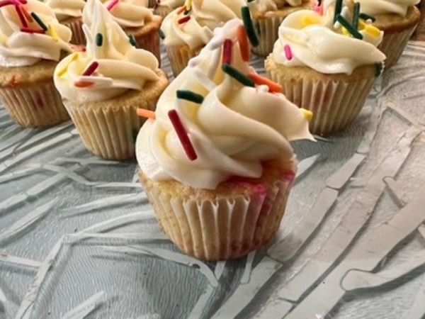 finished mini confetti cupcakes with rainbow sprinkles