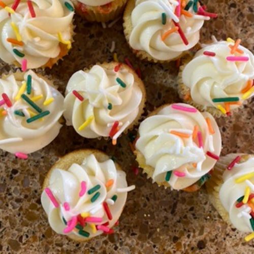 mini cupcakes with rainbow sprinkles