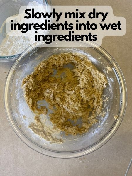 slowly add dry ingredients to wet ingredients