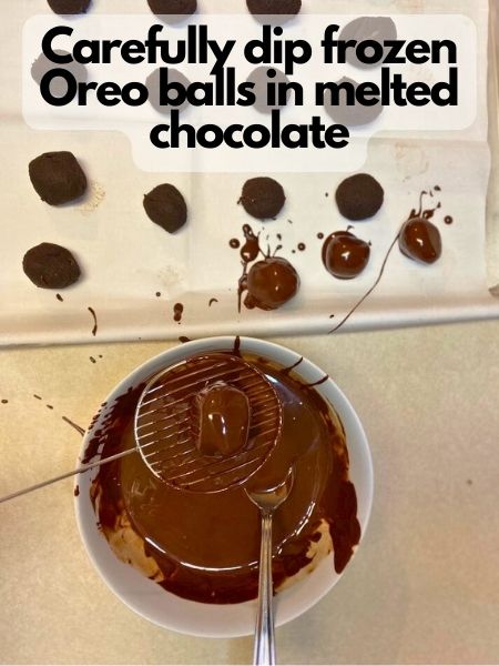 coat vegan Oreo balls in melted chocolate