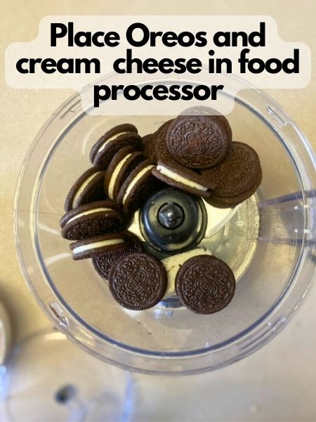 place Oreos and cream cheese in food processor