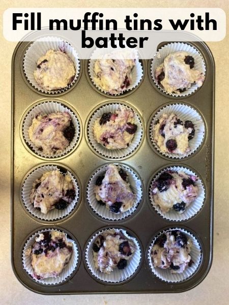 spoon muffin batter into muffin liners