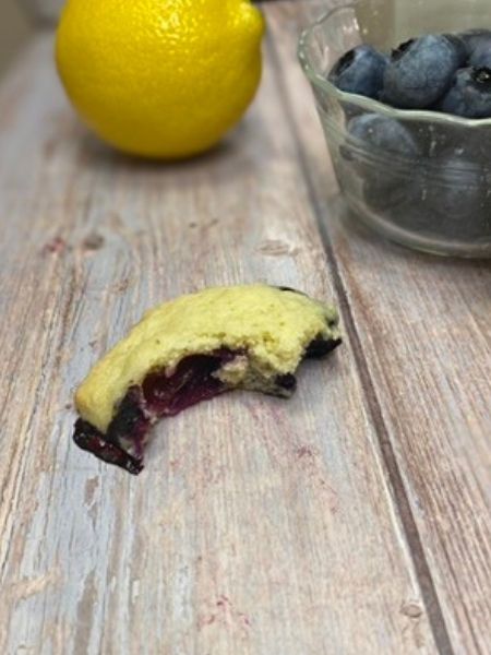 lemon blueberry cookie with bite taken out