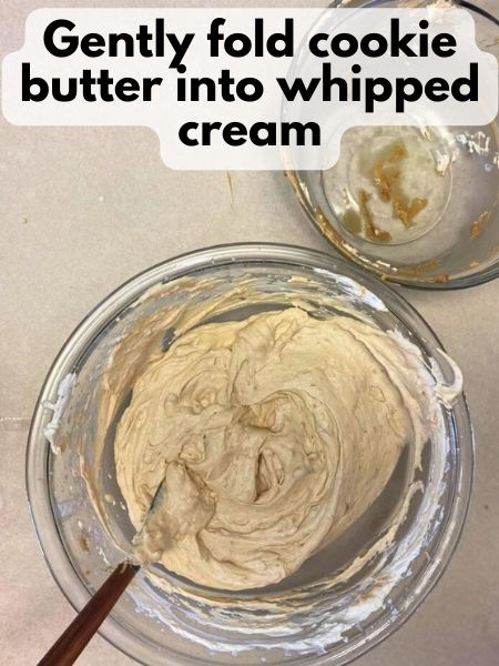 fold cookie butter mixture into whipped cream