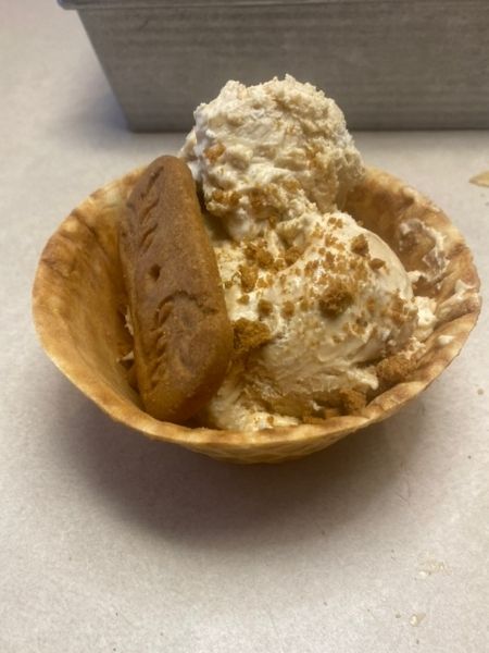 cookie butter ice cream in a waffle cone bowl