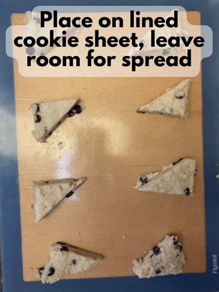 place scones on cookie sheet, leave room for spread