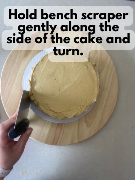 gently turn cake to smooth side