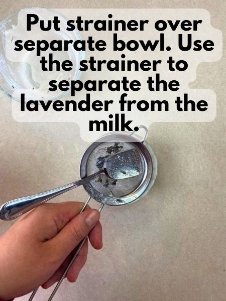 use strainer to separate lavender and milk