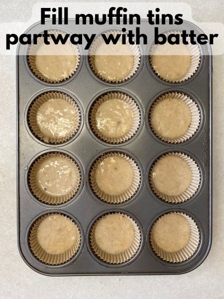 fill muffin tins partway with batter