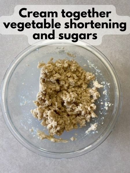 cream together vegetable shortening, brown sugar and sugar