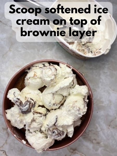 scoop ice cream on top of brownie