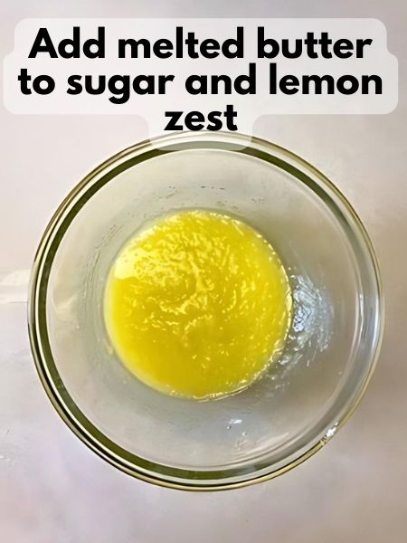 mix melted butter, sugar and lemon zest