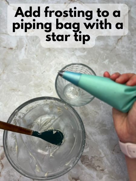 put frosting in a piping bag with a star tip