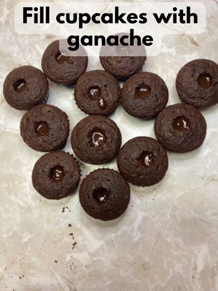 put ganache in cored cupcakes