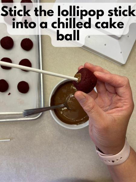 insert lollipop stick into cake ball