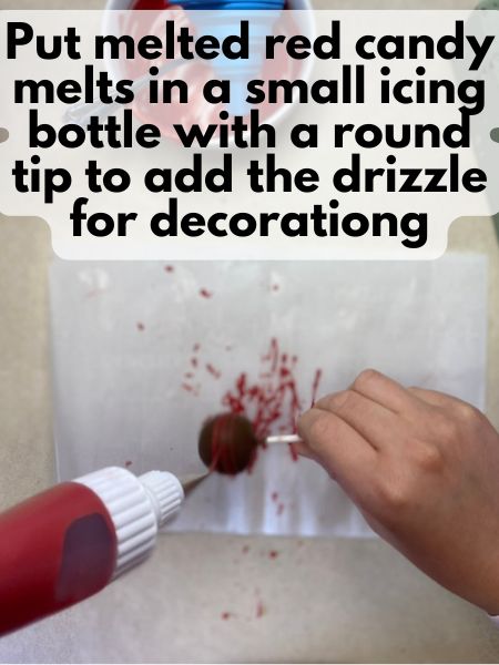 add more melting chocolate to a small icing bottle and drizzle for decorating