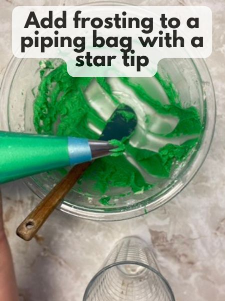 put frosting in a piping bag with a star tip