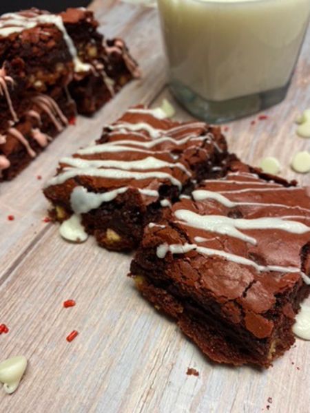 red velvet brownies with a glass of milk