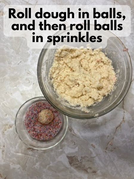 roll dough in sprinkles